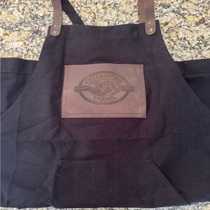 Creekstone Farms Black Apron with Brown Pocket